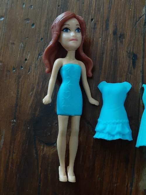 Small Doll with removable plastic dresses