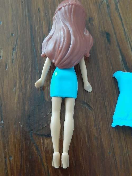 Small Doll with removable plastic dresses