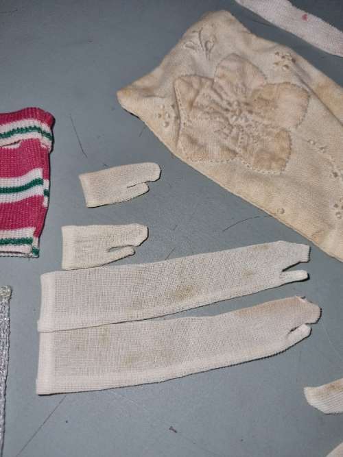 Vintage Barbie Clothing items, including gloves, lingerie, pillow case, cap, etc.