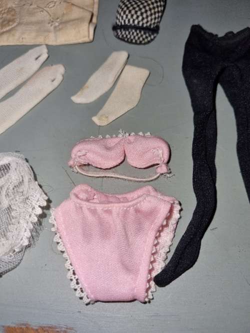 Vintage Barbie Clothing items, including gloves, lingerie, pillow case, cap, etc.