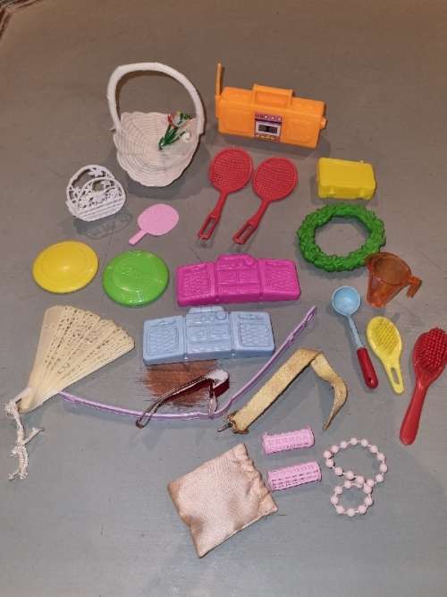 Barbie accessories including radios, rackets, curlers, belts, etc.