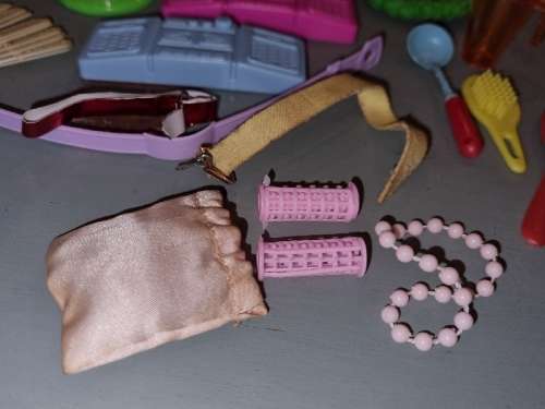 Barbie accessories including radios, rackets, curlers, belts, etc.