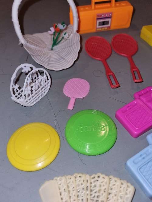 Barbie accessories including radios, rackets, curlers, belts, etc.