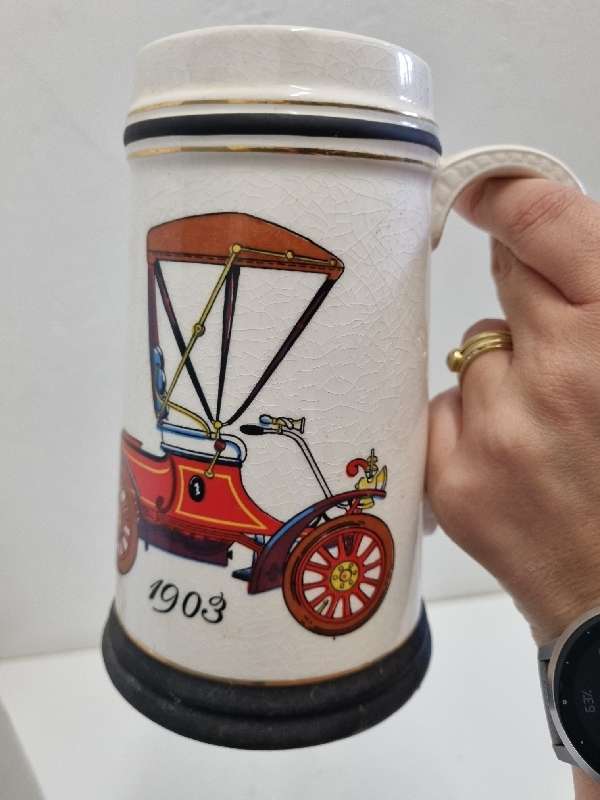 Vintage beer mug with vintage car detail