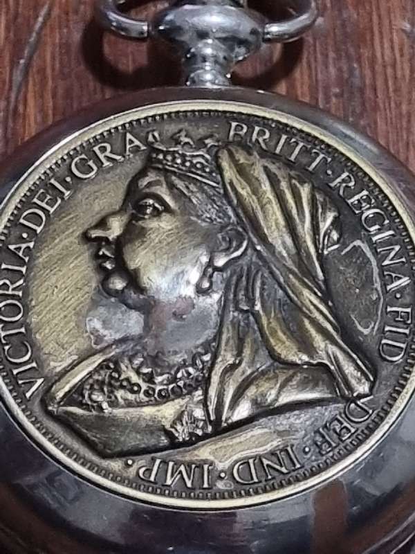 Pocket watch with replica of 1899 One Penny on one side