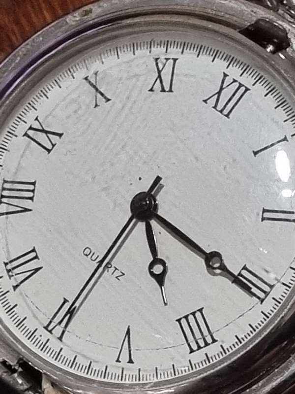 Pocket watch with replica of 1899 One Penny on one side