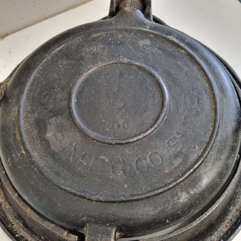 Vintage Wagner Cast Iron Waffle Maker on stand