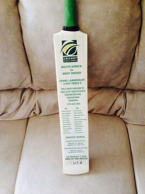 ** CHARL LANGEVELDT SIGNED HAT-TRICK BAT FOR SA **