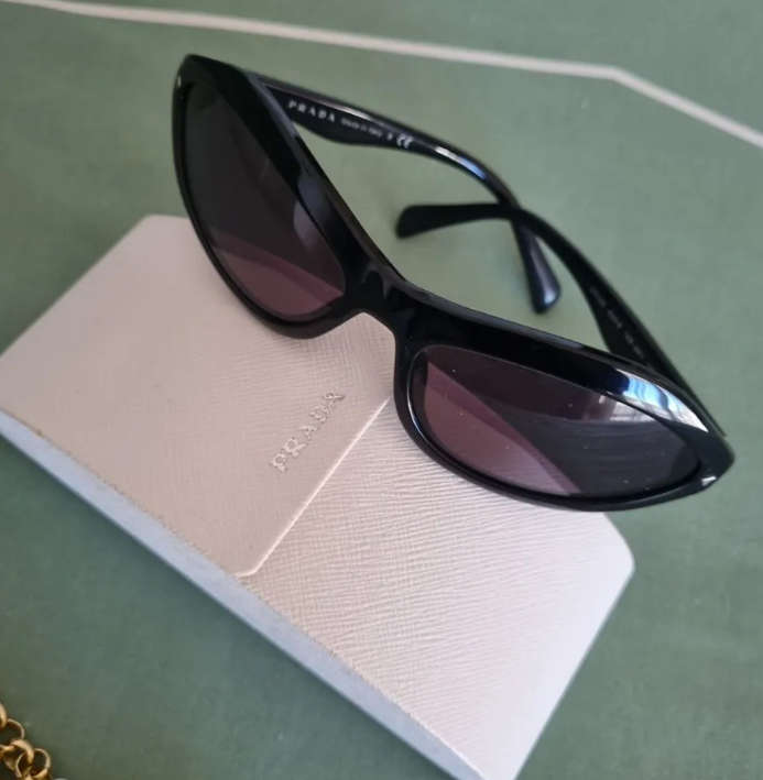 Gorgeous authentic cat eye Prada sunglasses for sale.