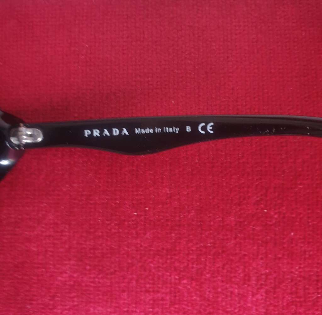 Gorgeous authentic cat eye Prada sunglasses for sale.