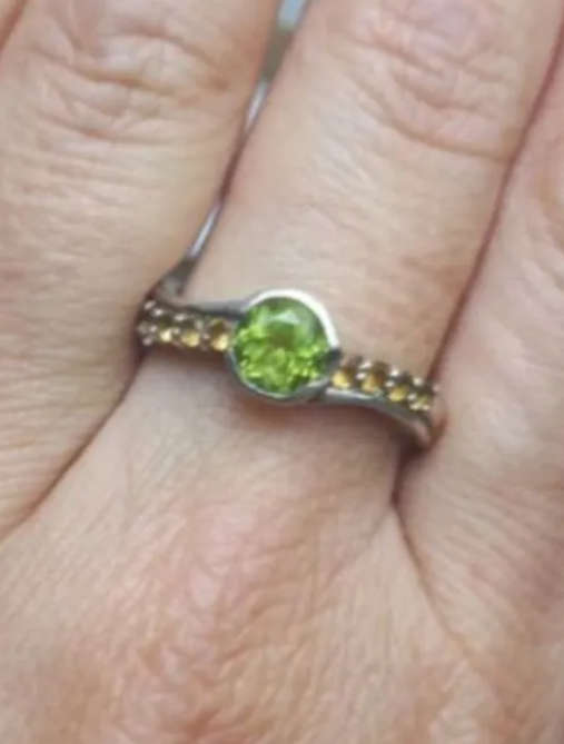 Beautiful sterling silver ring with peridot stone and citrines.