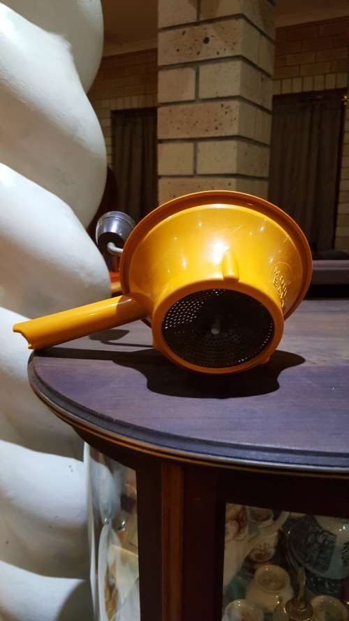 VINTAGE BABY FOOD MILL ORANGE