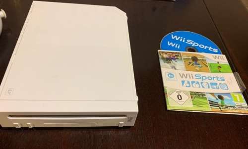 Nintendo wii console with remotes and wii sports