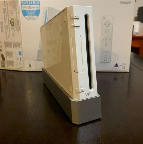 Nintendo wii console with remotes and wii sports