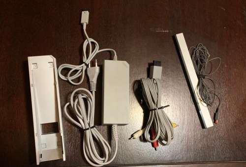 Nintendo wii console with remotes and wii sports