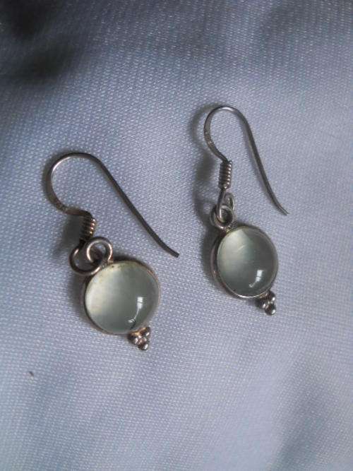 Vintage silver earrings with clear green stone
