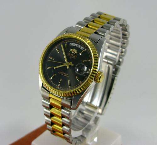 Rare Design Automatic Orient Oyster, Two Tones, Day & Date, Black Dial.