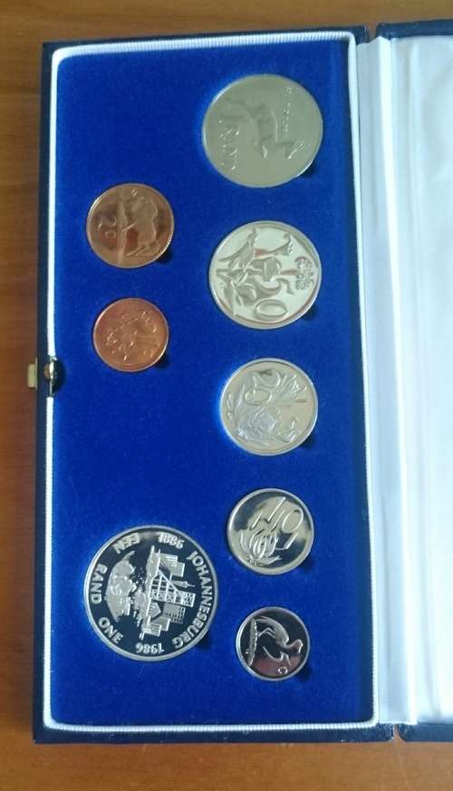 South Africa 1986 Johannesburg proof set in SAM case with silver one rand.