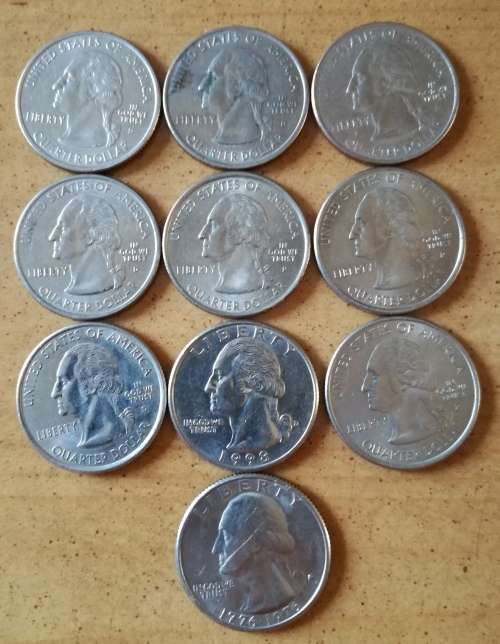 Collection of 10 different American quarter dollars.