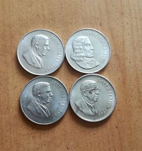 Collection of 4 silver one rands. One bid takes all.