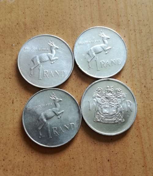 Collection of 4 silver one rands. One bid takes all.