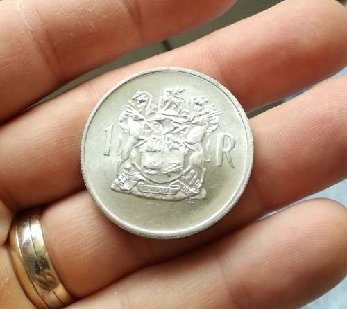 South Africa 1969 English silver one rand.