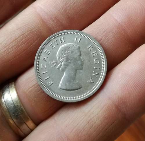 South Africa 1958 Silver Better grade Shilling.