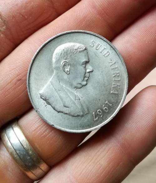 South Africa 1967 Afrikaans silver R1. Good condition.
