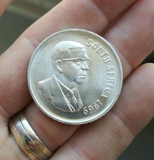South Africa 1969 Silver English one rand. Great condition.