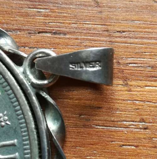 South Africa 1963 Silver 50 Cents in sterling silver clasp.