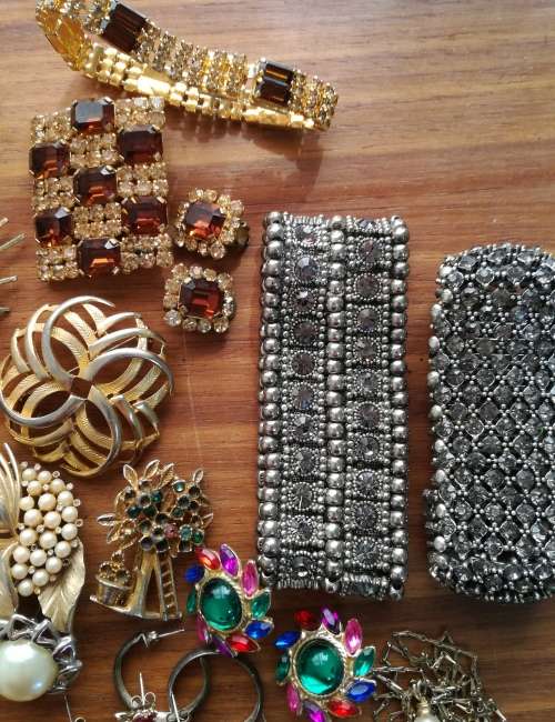 Large collection of vintage and costume jewelry. Some silver earrings.