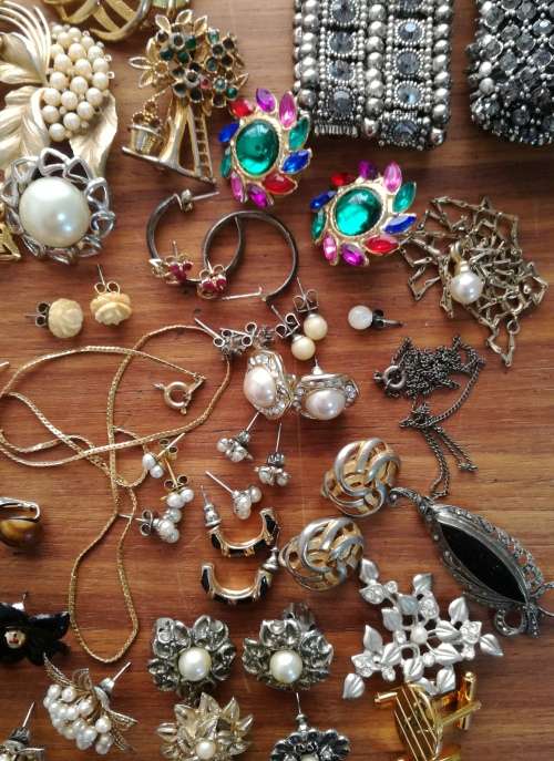 Large collection of vintage and costume jewelry. Some silver earrings.