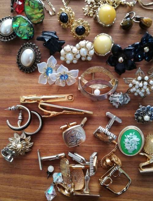 Large collection of vintage and costume jewelry. Some silver earrings.