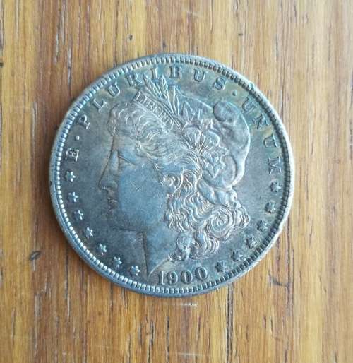 America 1900 O Silver Morgan Dollar. Good condition.