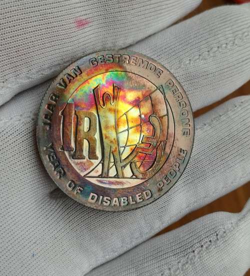 South Africa 1986 Silver Proof Year of Disabled one rand. Beautiful toning.