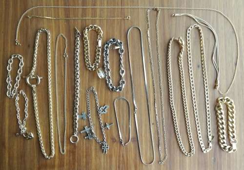 Large collection of 17 ladies and men`s necklaces and one ring.