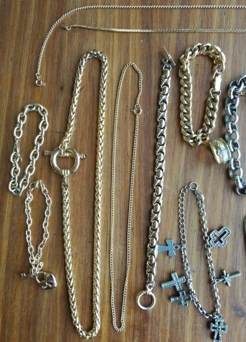Large collection of 17 ladies and men`s necklaces and one ring.