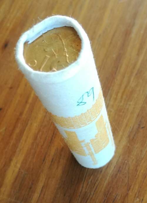 Trust Bank 1989 Full unopened roll one cents and trust Bank material bank bag.