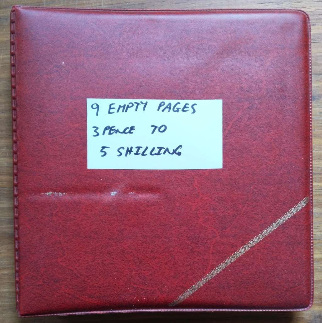 Coin album with 9 empty pages.