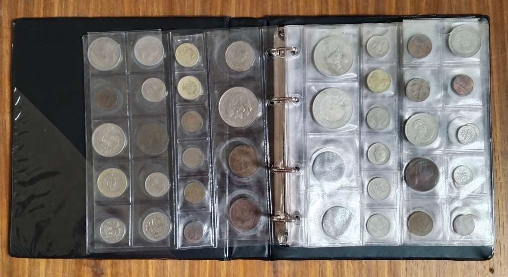 Collection of 113 old coins with album. Nice collection.