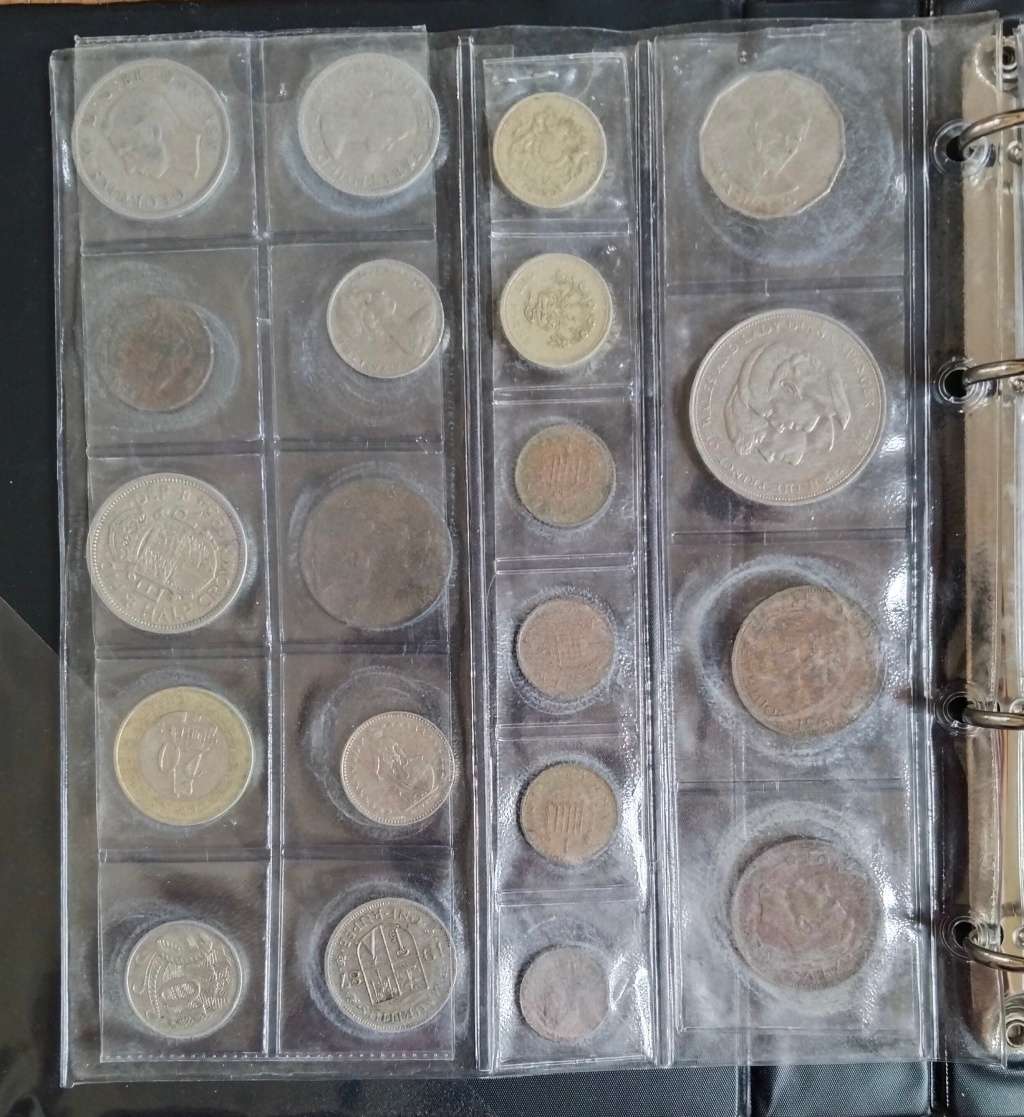 Collection of 113 old coins with album. Nice collection.