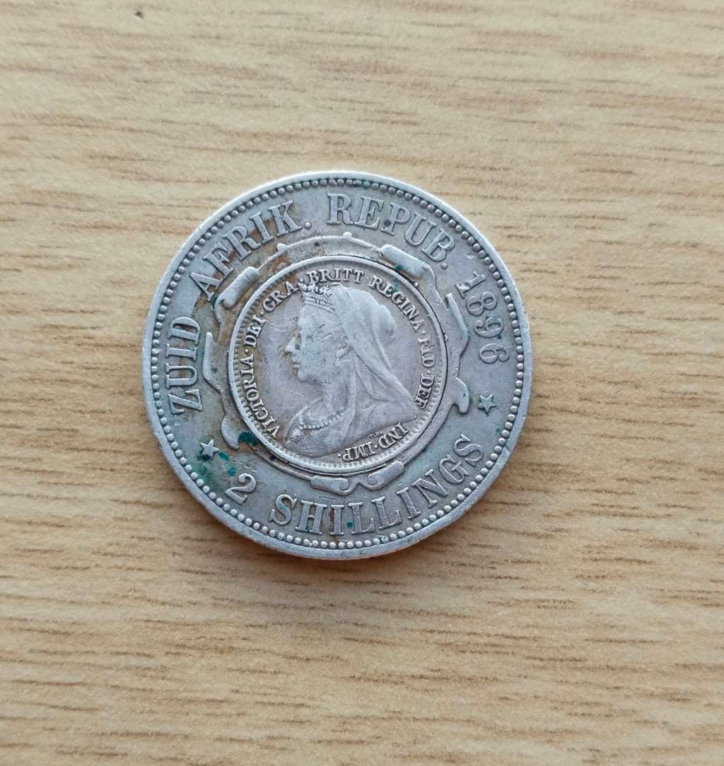 ZAR PAUL Kruger 1896 Silver Two Shillings with a Queen Victoria Silver threepence inside.