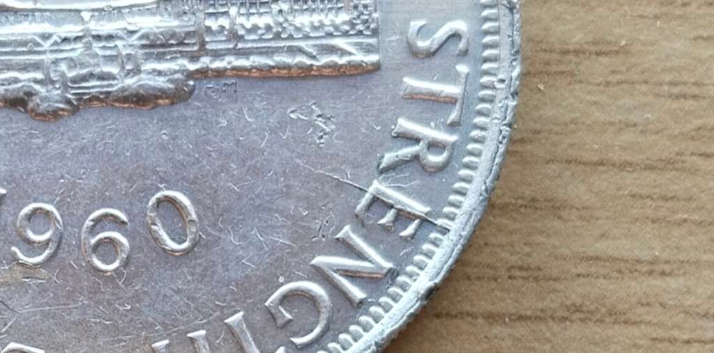 Error on 2 places South Africa Silver 1960 5 Shillings.