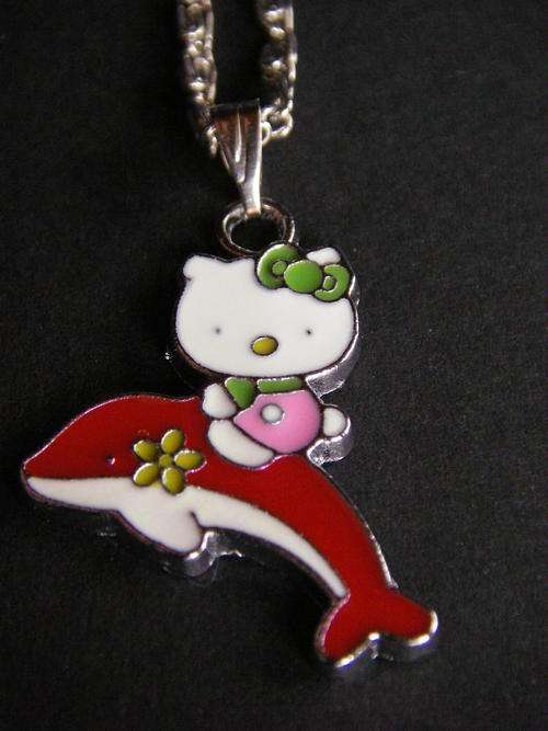 Hello Kitty riding dolphin pendant and necklace chain
