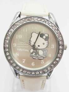 White ladies, womens Hello Kitty wrist watch with swarovski crystals surrounding face