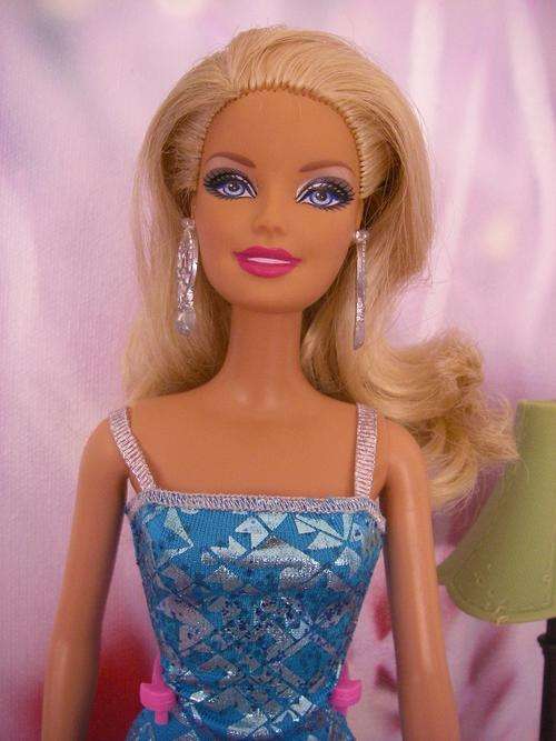 Mattel 2010 blonde Barbie doll in blue dress.  Perfect condition. As good as new. Perfect hair.