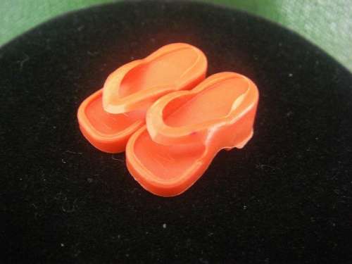 Red Barbie doll slops, beach shoes