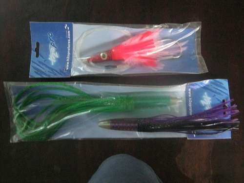 www.h2oprolures.com 36 Fishing Lures  unused still in packets & carrying bags sea fishing