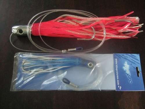 www.h2oprolures.com 36 Fishing Lures  unused still in packets & carrying bags sea fishing