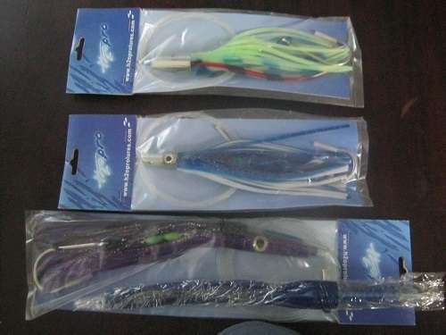 www.h2oprolures.com 36 Fishing Lures  unused still in packets & carrying bags sea fishing